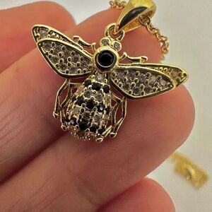 Gold tone rhinestone bee pendant necklace